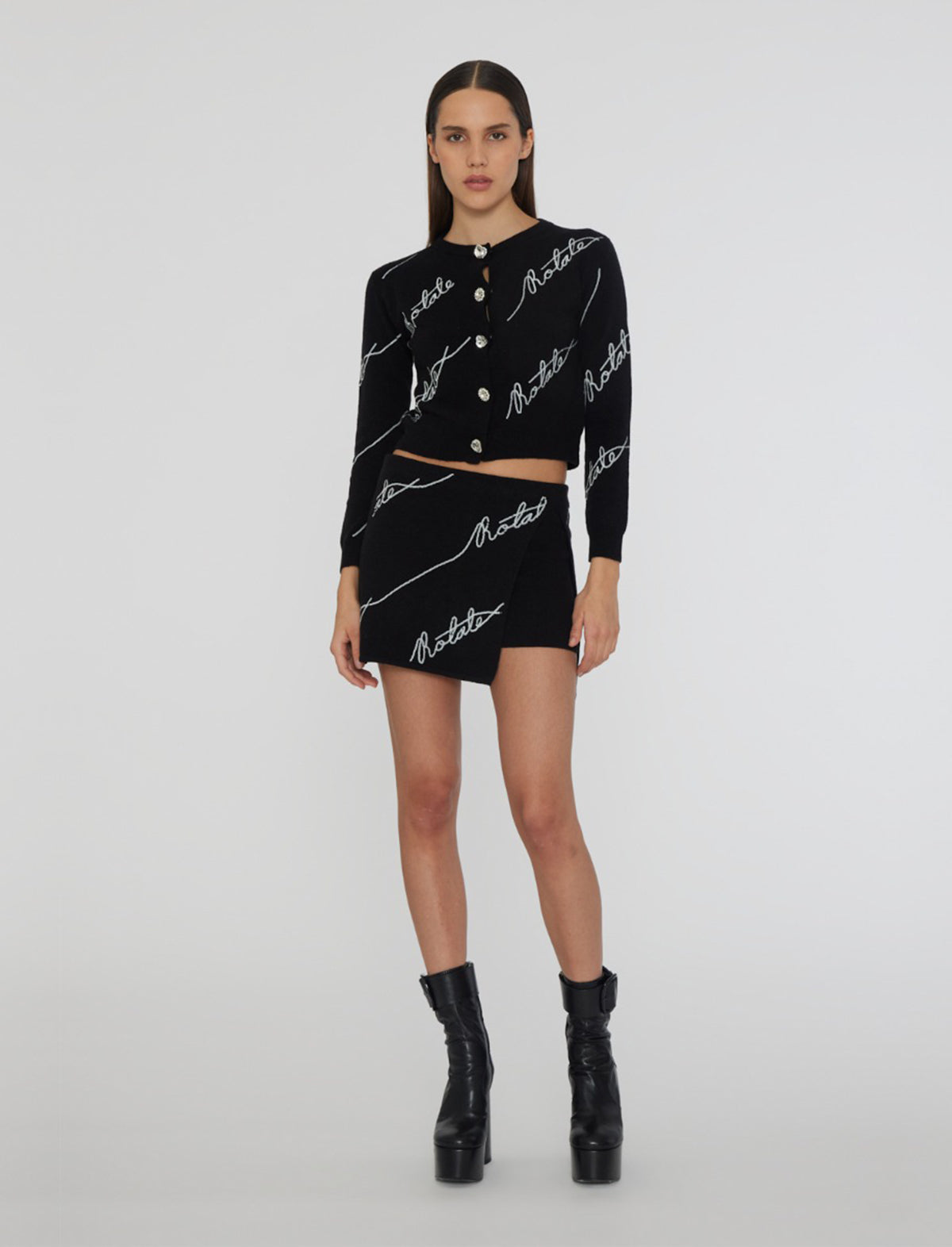 ROTATE BIRGER CHRISTENSEN Sequin Logo Knit Mini Skirt in Black