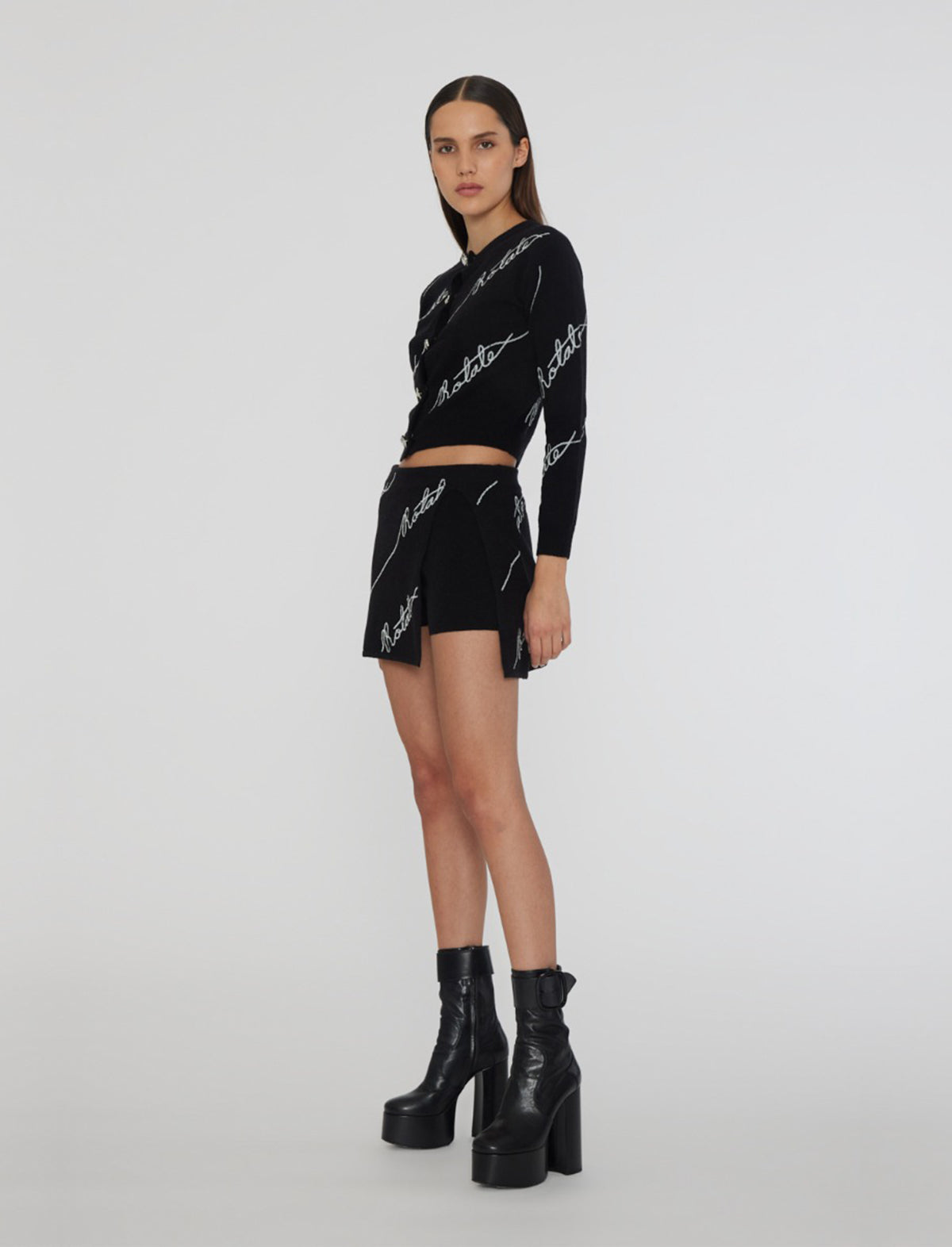 ROTATE BIRGER CHRISTENSEN Sequin Logo Knit Mini Skirt in Black