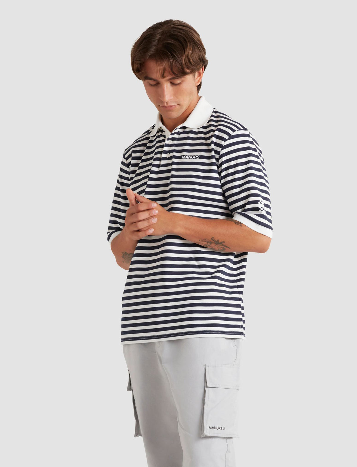 MANORS GOLF Striped Pique Polo in Cream / Navy