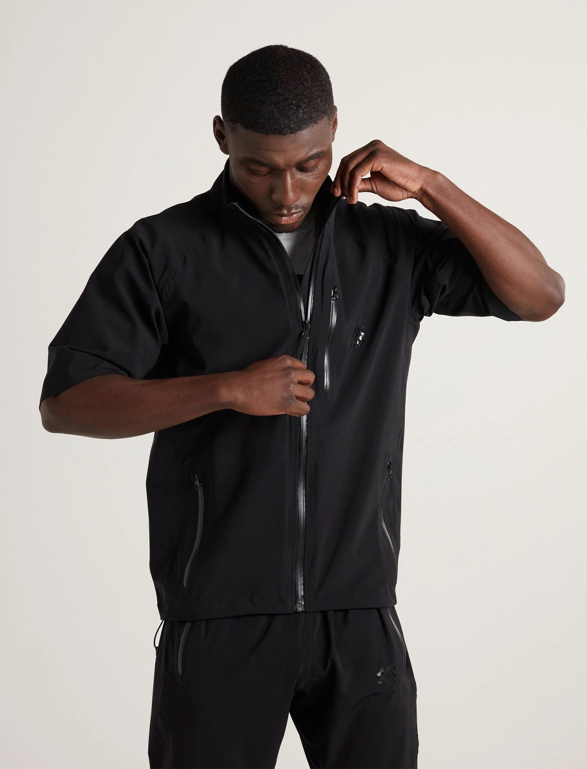 MANORS GOLF 2.5L Breathable Waterproof Shirt in Black