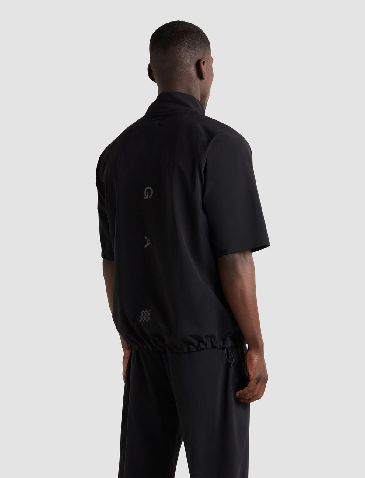 MANORS GOLF 2.5L Breathable Waterproof Shirt in Black