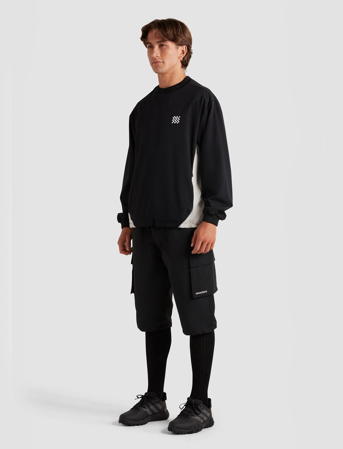 MANORS GOLF Zip Off Tech-Plus Four Pants in Black