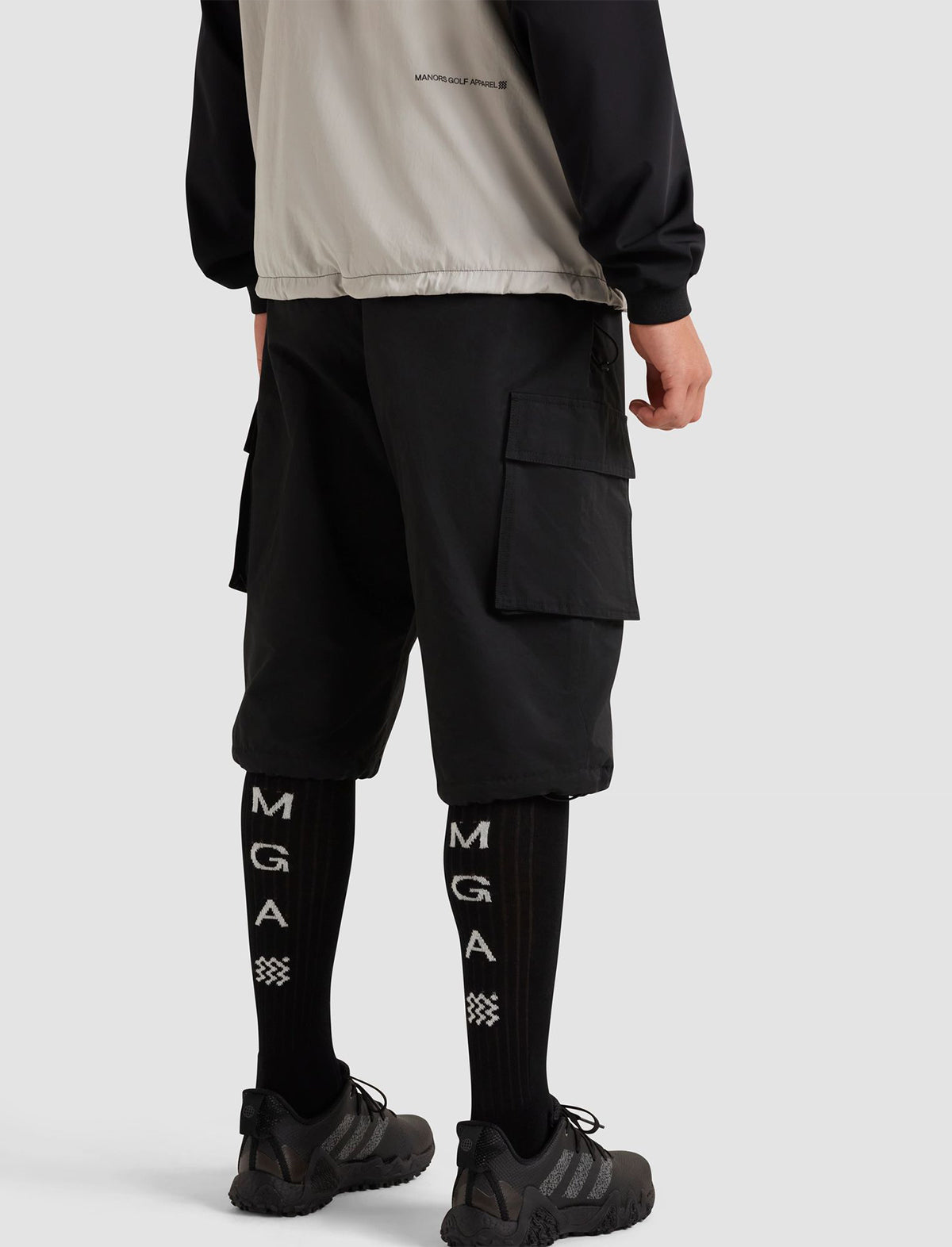 MANORS GOLF Zip Off Tech-Plus Four Pants in Black
