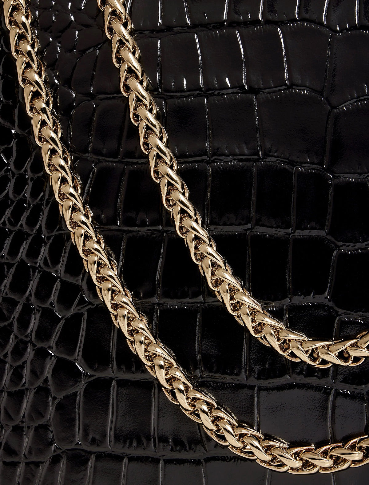 STRATHBERRY EAST/WEST EMBOSSED CROC in Black