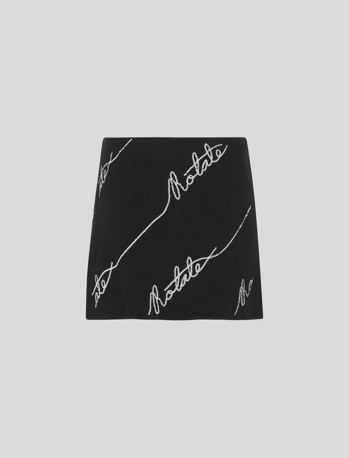 ROTATE BIRGER CHRISTENSEN Sequin Logo Knit Mini Skirt in Black