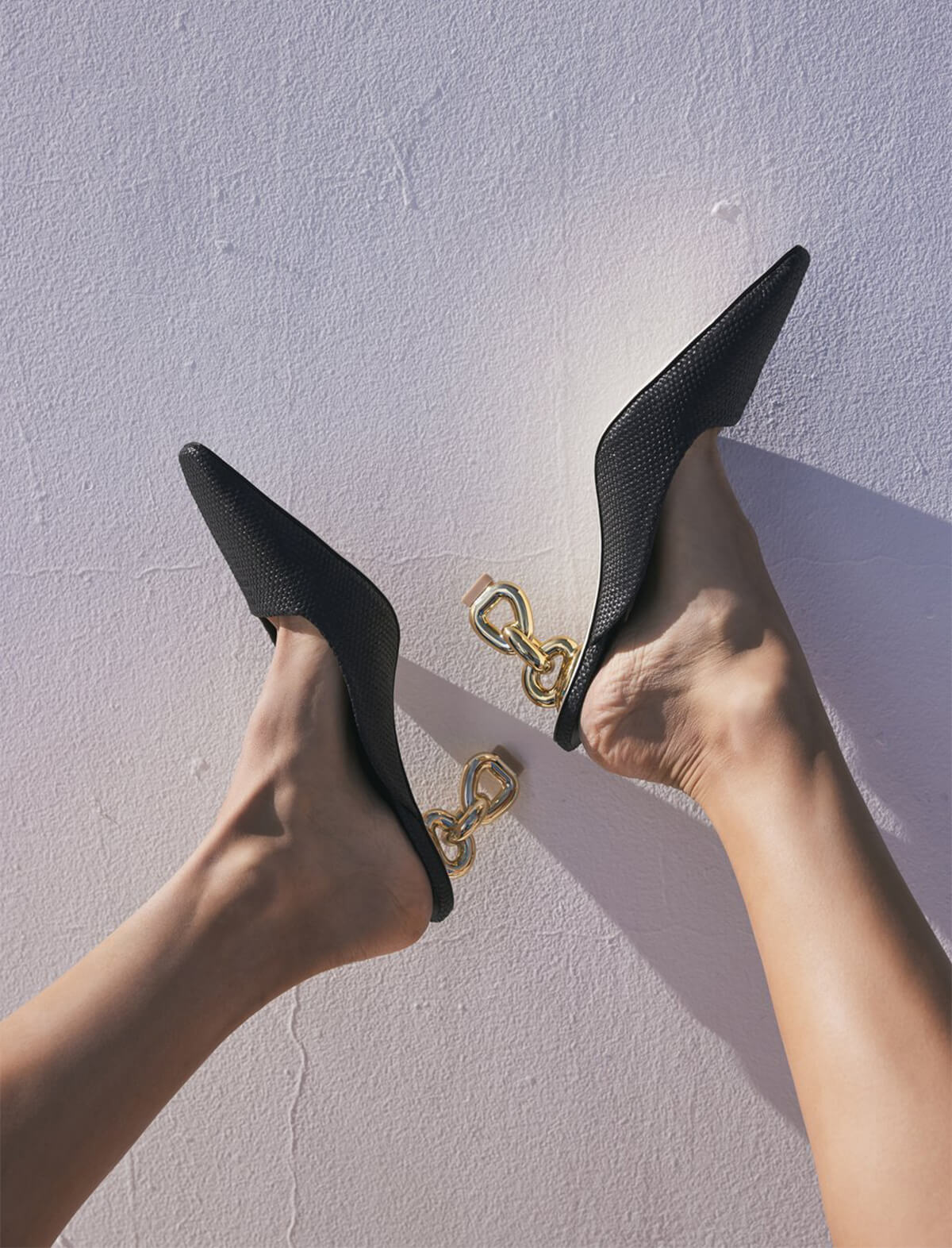 CULT GAIA Harlow Mules in Black and Gold