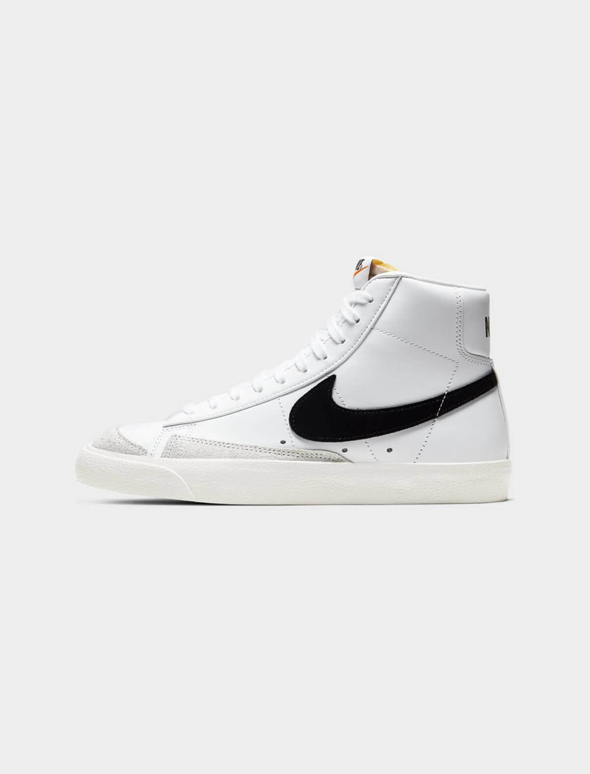 Nike Women's Blazer Mid '77 Sneakers in White/Black